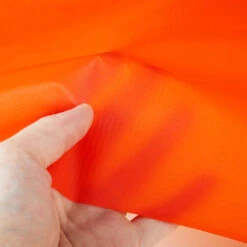 Ripstop 0.75 Oz. Orange 60" Nylon Sailcloth 7 Ripstop 0.75 Oz. Orange 60" Nylon Sailcloth -Famous Fabric Store Ripstop Orange Nylon Sailcloth 3 4oz 60 3